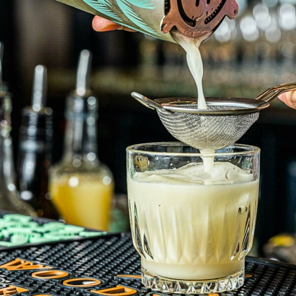 Bar tender making a cocktail drink